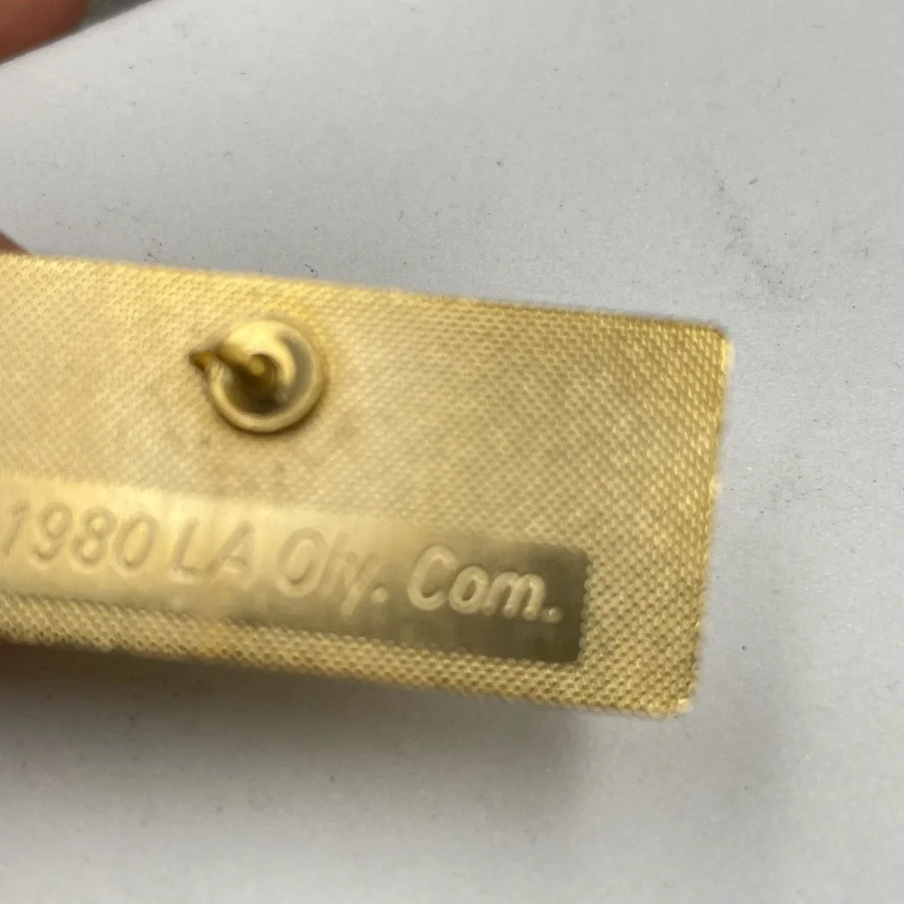 Vintage 1980 LAOLY Arco Olympics Classic Gold-Tone Arrowhead Water Lapel Pin 80s